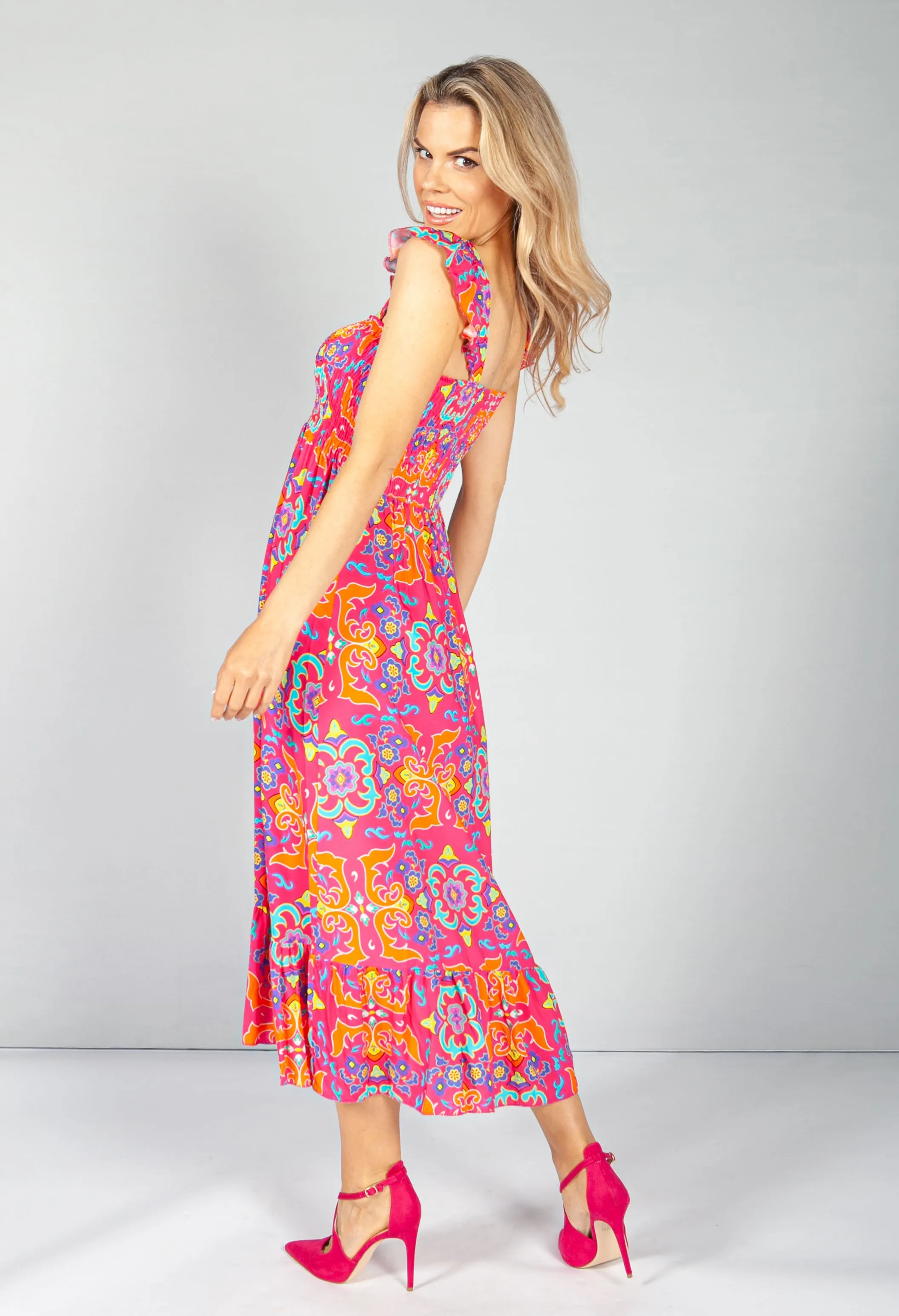 Playful Pink Vintage Print Dress with Smocking Bodice